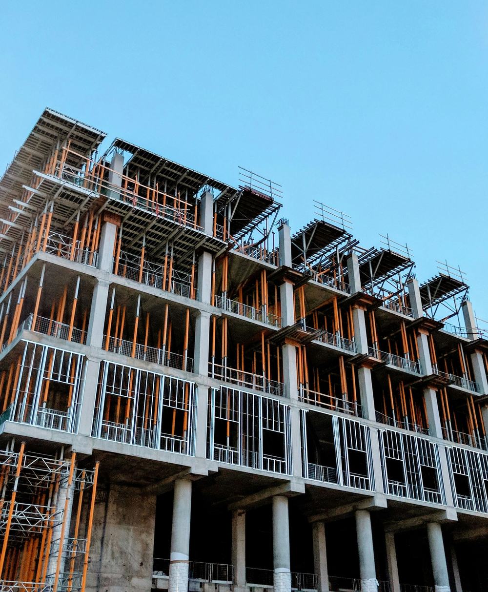 Multi-storey building under construction with steel framing